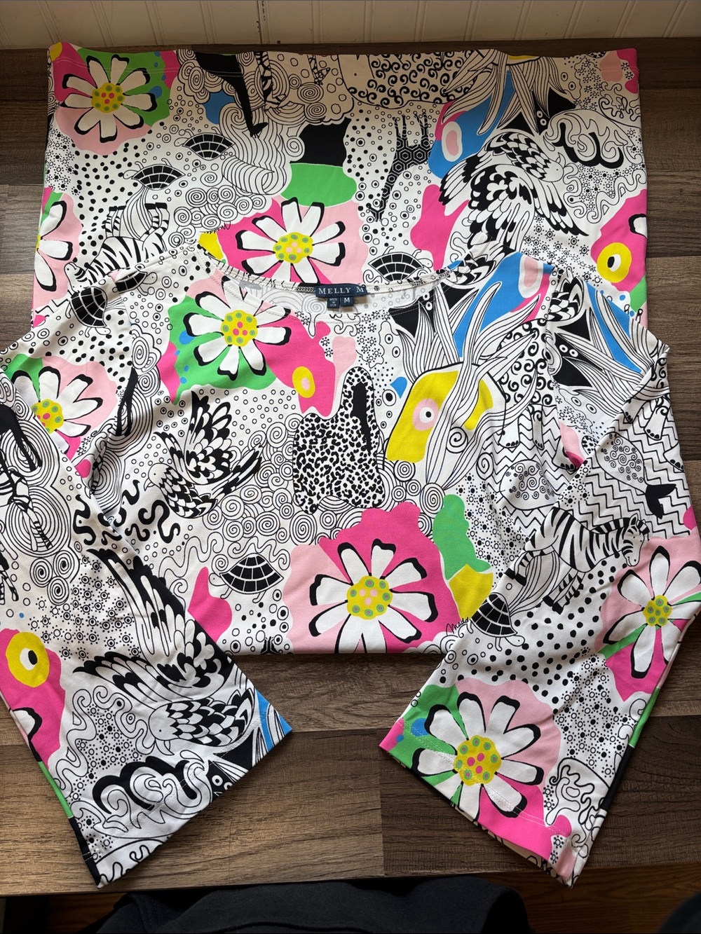 vintage Melly M 3/4 sleeve top featuring a colorful, abstract, and floral design
